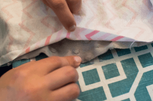 Learn how to sew with this easy 30 minute baby blanket tutorial, perfect for a beginner! Mama and baby will love the softness of the fabric and the thoughtfullness of this homemade gift. #sewing #crafts #homemade #baby