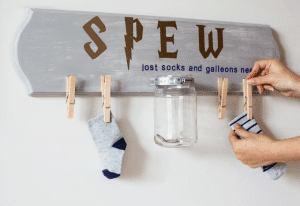 Pay homage to Hermione and S.P.E.W. with this fun Harry Potter laundry sign! Use it to collect lost socks and spare galleons and support the promotion of elfish welfare.