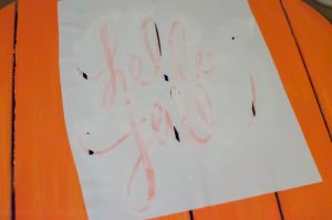 Learn how to easily make a stencil with your Silhouette cutting machine and use it to decorate a Hello Fall wreath to hang on your front door!
