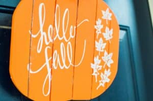 Learn how to easily make a stencil with your Silhouette cutting machine and use it to decorate a Hello Fall wreath to hang on your front door!
