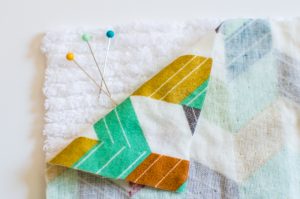 These DIY organic washcloths are the perfect beginner sewing project! Pair them with a gentle cleanser that will keep your little one's sensitive and dry skin from becoming painfully chapped in the winter months for a great baby shower gift! #SettingTheBeautyBar #DovePartner