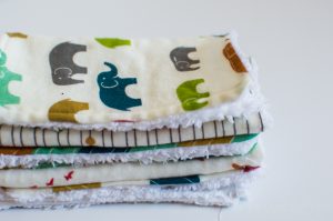 These DIY organic washcloths are the perfect beginner sewing project! Pair them with a gentle cleanser that will keep your little one's sensitive and dry skin from becoming painfully chapped in the winter months for a great baby shower gift! #SettingTheBeautyBar #DovePartner