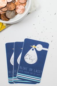 Download these gender reveal scratch-off tickets and use them to creatively tell your friends and family whether you're team pink or blue!