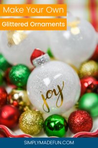 white glitter ornaments with a gold foil design