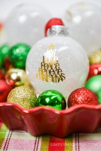 white glitter ornaments with a gold foil design