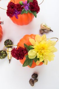 Floral Mickey Ears pumpkin - I hate spending money on pumpkins that mold quickly and make a mess when you carve them. So I'm switching to a simple + cheap version, styrofoam pumpkins from the Dollar Tree, to make my very own Floral Mickey Ears pumpkin!