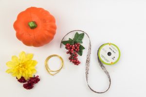 Floral Mickey Ears pumpkin - I hate spending money on pumpkins that mold quickly and make a mess when you carve them. So I'm switching to a simple + cheap version, styrofoam pumpkins from the Dollar Tree, to make my very own Floral Mickey Ears pumpkin!