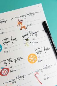 Holiday Gift Tags - The print and cut feature on the Silhouette makes it so easy to DIY personalized gift tags for your holiday parties this year! You can download the PNG + SVG files for both Cricut and Silhouette users and give each of your gifts a little bit of homemade flair this season.