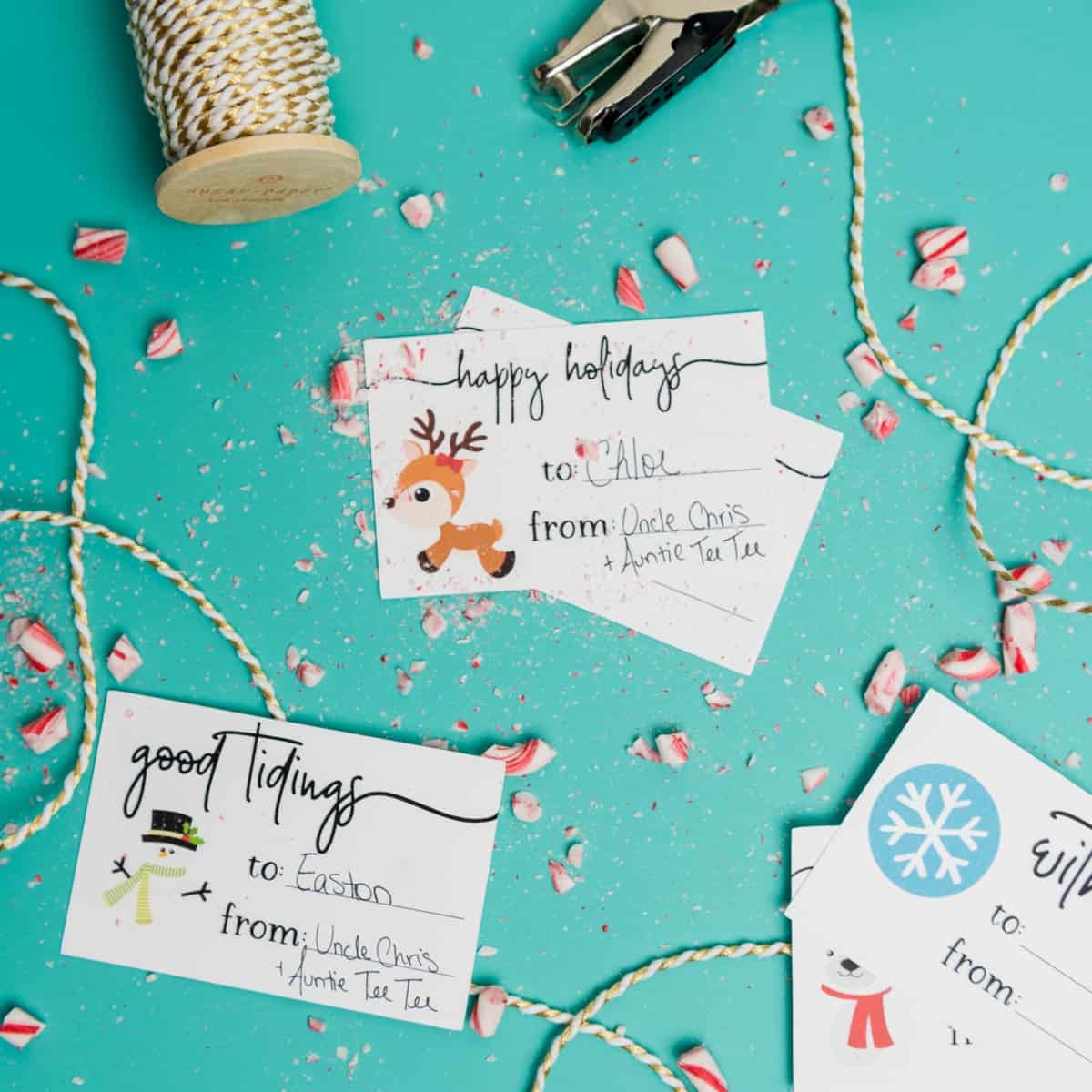 Holiday Gift Tags - The print and cut feature on the Silhouette makes it so easy to DIY personalized gift tags for your holiday parties this year! You can download the PNG + SVG files for both Cricut and Silhouette users and give each of your gifts a little bit of homemade flair this season.