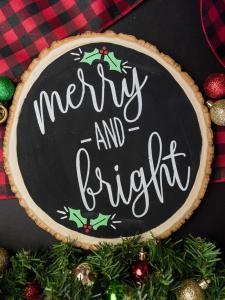 Merry and Bright Christmas Sign - I love saving room and money on Christmas decorations and reversible signs are the perfect way to do both! Using your cutting machine you can repurpose old holiday decor with a new rustic and minimalist design! Free SVG + PNG + DXF file included so you can make one too.