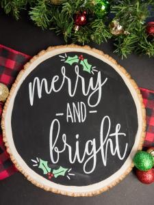 Merry and Bright Christmas Sign - I love saving room and money on Christmas decorations and reversible signs are the perfect way to do both! Using your cutting machine you can repurpose old holiday decor with a new rustic and minimalist design! Free SVG + PNG + DXF file included so you can make one too.