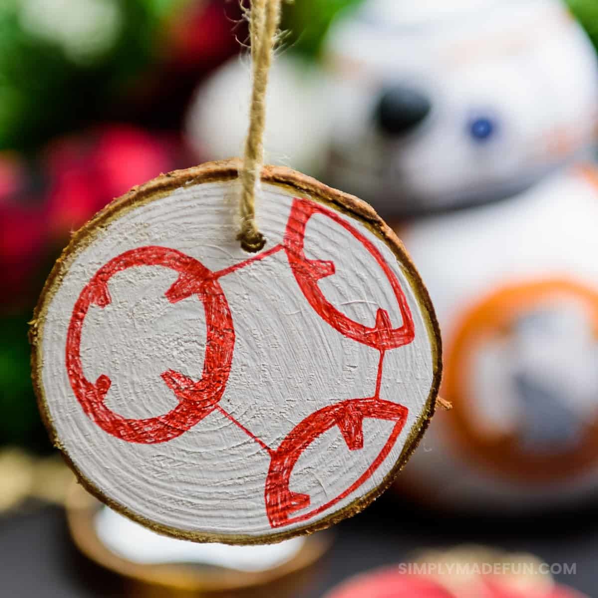 Star Wars Ornaments - Make your own rustic Star Wars Ornaments with wood slices, DecoArt paint, and your Silhouette machine! This simple + quick DIY is perfect for the Star Wars fans in your life!