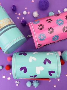 Valentine's Day Mailboxes - I am slightly addicted to the Target Dollar Spot when it comes to finding things to craft with. These cute mailboxes I found are perfect to personalize with vinyl and washi tape and give your kids a fun box to put their classmates Valentine's in!
