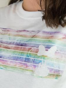 Deco Foil Disney Shirt - Use Deco Foil from Expressions Vinyl to create a screen printed look to your fabric with heat transfer vinyl! It's such an easy, quick, and colorful DIY and gives your fabric a screen printed look, even though you're using vinyl.