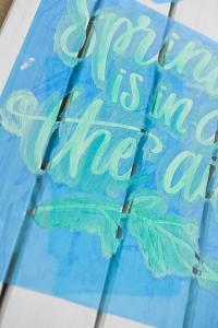 Painted Wooden Spring Sign - Dress up your front porch or your mantle this spring with a bright and colorful wooden sign! Use your Silhouette Cameo to cut out a stencil and pick your favorite paint colors to make this sign your own. It's fun, easy, and you can do it in 20 minutes (or less!).