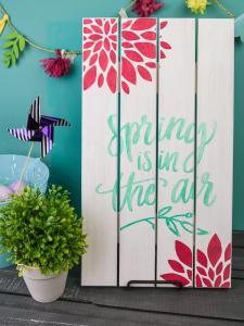 Painted Wooden Spring Sign - Dress up your front porch or your mantle this spring with a bright and colorful wooden sign! Use your Silhouette Cameo to cut out a stencil and pick your favorite paint colors to make this sign your own. It's fun, easy, and you can do it in 20 minutes (or less!).