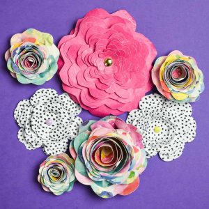 3D Paper Flowers - Sometimes it seems like all I do with my Silhouette Machine are crafts with vinyl. But I'm starting to make myself use paper more because it's easy and cheap! Like these 3D paper flowers, they're a quick craft to do on a rainy day and there are so many different kinds to make!