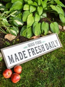 Modern Farmhouse Kitchen Sign - Use your Silhouette Cameo to add a little Farmhouse charm to your kitchen with the FREE farmhouse inspired SVG + PNG file! All it takes is 8 supplies (or less!) to make a one of a kind sign to hang up in your home.