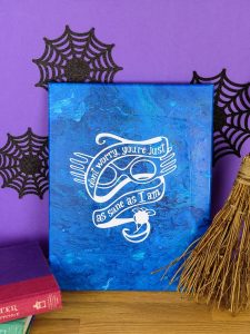 Acrylic Pour Canvas - This is one messy DIY but it is really fun to make too! You can get creative with color and design and no two art projects will be the same! It's the perfect art piece for your home that YOU made all on your own!