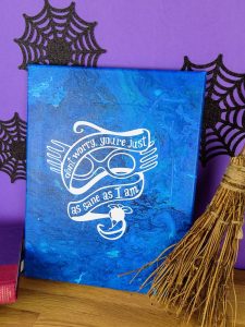 Acrylic Pour Canvas - This is one messy DIY but it is really fun to make too! You can get creative with color and design and no two art projects will be the same! It's the perfect art piece for your home that YOU made all on your own!