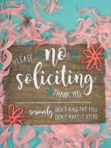 No Soliciting Sign - Who else gets tired of people ringing your doorbell just so they can sell you something? It happens so frequently here and I just wanted it to stop! So I pulled out my Silhouette Cameo and made this no soliciting sign with stencil vinyl and colorful paint in just five easy steps!
