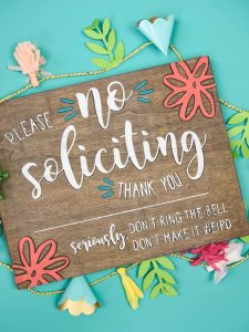 No Soliciting Sign - Who else gets tired of people ringing your doorbell just so they can sell you something? It happens so frequently here and I just wanted it to stop! So I pulled out my Silhouette Cameo and made this no soliciting sign with stencil vinyl and colorful paint in just five easy steps!