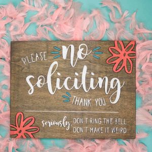 No Soliciting Sign - Who else gets tired of people ringing your doorbell just so they can sell you something? It happens so frequently here and I just wanted it to stop! So I pulled out my Silhouette Cameo and made this no soliciting sign with stencil vinyl and colorful paint in just five easy steps!