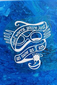 Harry Potter Acrylic Paint Poured Canvas - This poured canvas is the perfect craft night project to DIY with friends! It's fun, messy, and no two canvases will be alike! You can leave them blank or use vinyl and your Silhouette or Cricut machine to dress them up a bit, like with a fun Harry Potter inspired quote or image...or really anything that you like. This craft project is colorful and easy, all you do is mix paint with water and pour!