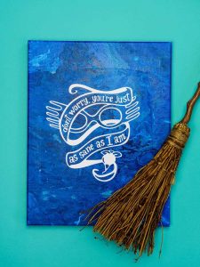 Harry Potter Acrylic Paint Poured Canvas - This poured canvas is the perfect craft night project to DIY with friends! It's fun, messy, and no two canvases will be alike! You can leave them blank or use vinyl and your Silhouette or Cricut machine to dress them up a bit, like with a fun Harry Potter inspired quote or image...or really anything that you like. This craft project is colorful and easy, all you do is mix paint with water and pour!