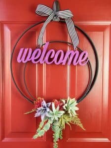 Use fake plants to make a faux succulent wreath for your front door!